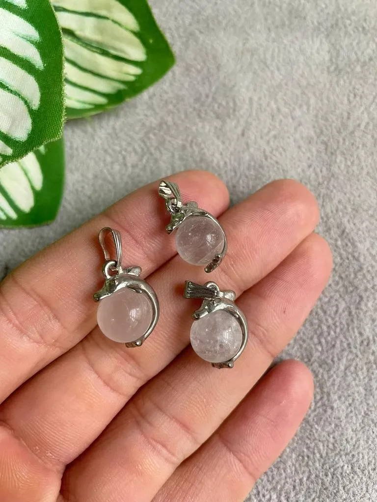 Dije de pendulo con delfin