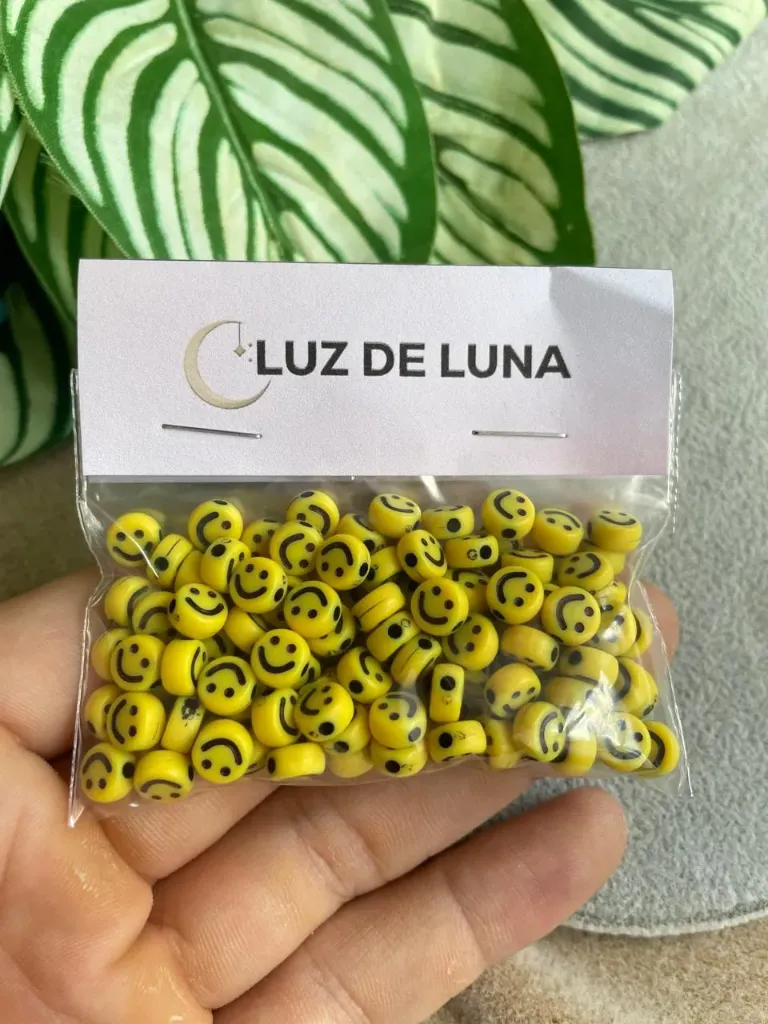 Bolsa de caritas acrilicas amarillas